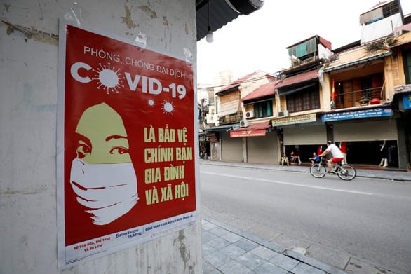 Chuyên gia nước ngoài tin vào hiệu quả chống dịch của Việt Nam - Ảnh 1.