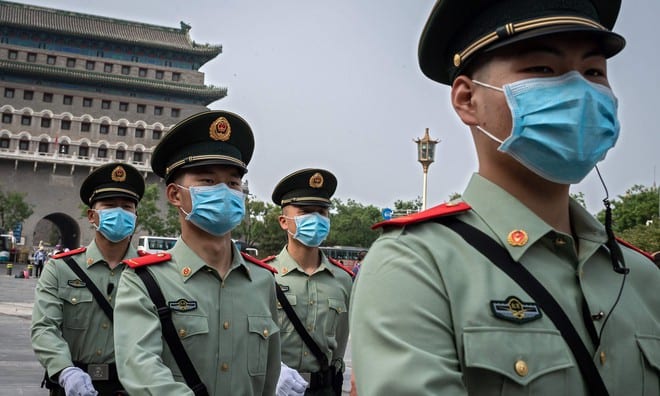 Cảnh sát bán vũ trang tại Bắc Kinh, Trung Quốc /// AFP