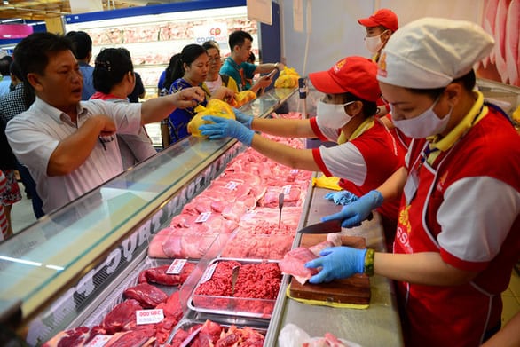 Giá thịt heo giảm, kéo lạm phát tháng 11 giảm 0,01% - Ảnh 1.