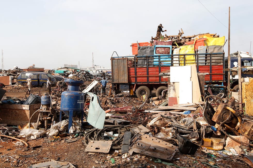Ô nhiễm kinh hoàng tại bãi rác thải điện tử lớn nhất thế giới - Ảnh 4.