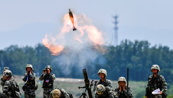 Nhật Bản quan ngại chiến lược mở rộng quân đội của Trung Quốc - Ảnh 1.