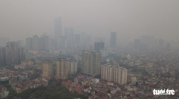 Không khí tại nhiều nơi ở Hà Nội ô nhiễm nặng - Ảnh 1.