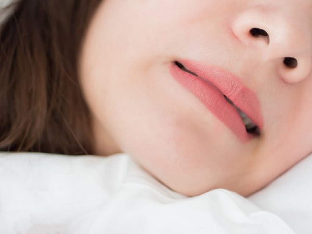 Làm sao trị nghiến răng lúc ngủ? - ảnh 1